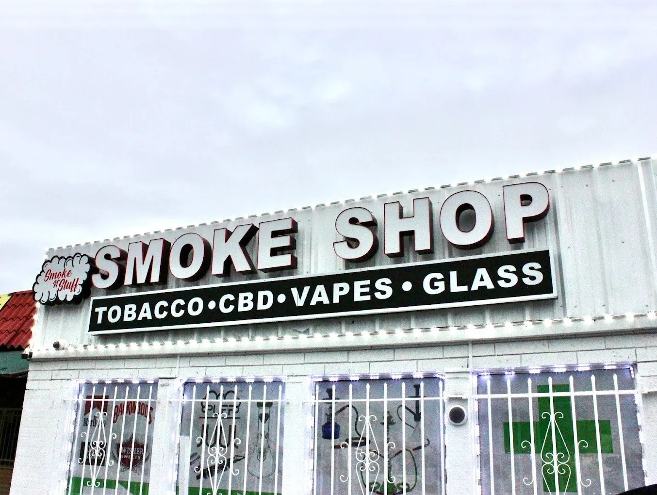 Smoke N' Stuff storefront with Tobacco CBD Vapes Glass signage